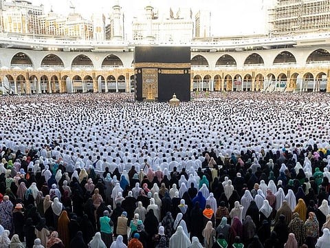 The faithful perform their Eid Al Fitr prayers at the Grand Mosque, in Mecca, Saudi Arabia, on April 21, 2023.