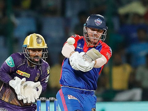 Captain David Warner of the Delhi Capitals hits a four in the Tata Indian Premier League match against the Kolkata Knight Riders at the Arun Jaitley Stadium, Delhi, on April 20, 2023. Warner scored more freely and more quickly as he struck 57 to set up Delhi’s chase.