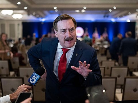 MyPillow chief executive Mike Lindell talks to reporters at the Republican National Committee winter meeting in Dana Point, Calif., Friday, Jan. 27, 2023.