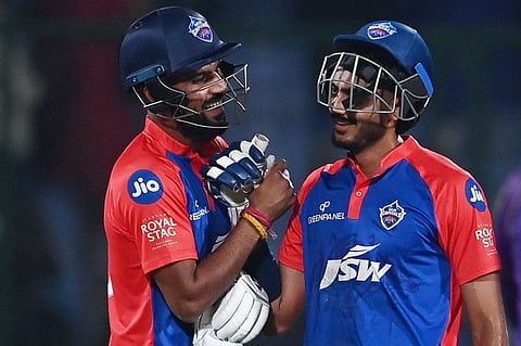 Delhi Capitals' Axar Patel (right) and Lalit Yadav celebrate after winning the match against Kolkata Knight Riders on Thursday.