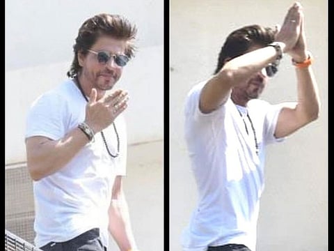 Bollywood actor Shah Rukh Khan greeting fans outside 'Mannat', his Mumbai residence, on April 22, 2023.