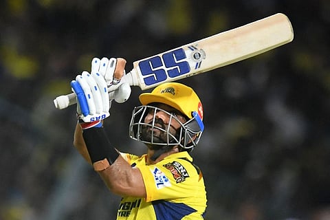 Chennai Super Kings' Ajinkya Rahane plays a shot during his half-century against Kolkata Knight Riders.