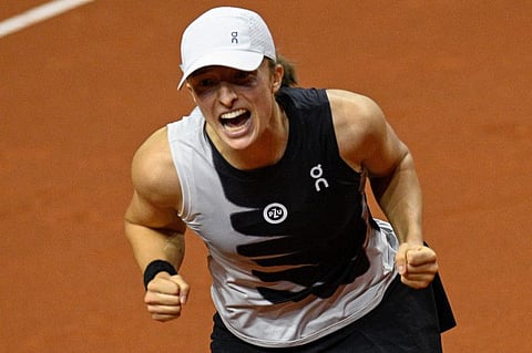 Poland's Iga Swiatek celebrates after winning the Women's Tennis Grand Prix WTA tournament final against Aryna Sabalenka in Stuttgart on Sunday.