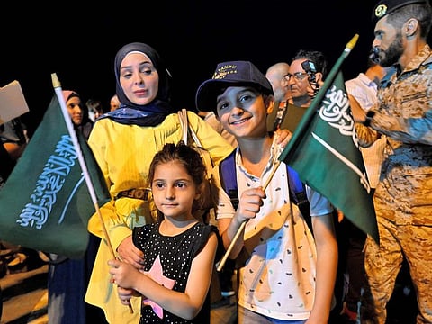 Evacuees arrive at King Faisal navy base in Jeddah following a rescue operation from Sudan.