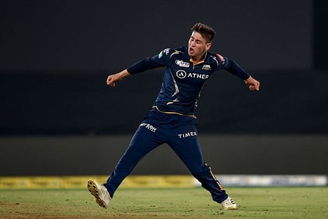 Gujarat Titans' Noor Ahmad celebrates after the dismissal of Mumbai Indians' Cameron Green in Ahmedabad on Tuesday.