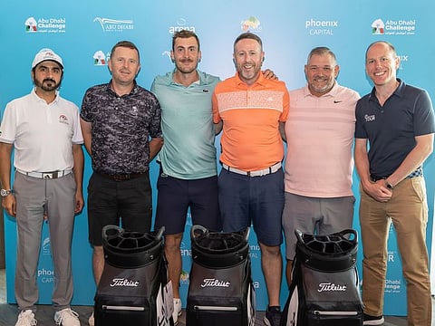 Professional Ugo Coussard (Centre) with his winning Arena 1 Team in the Pro-Am with Akram Skaik, General Secretary of the Emirates Golf Federation (left) and Jamie Hodges, Head of the Challenge Tour (right)