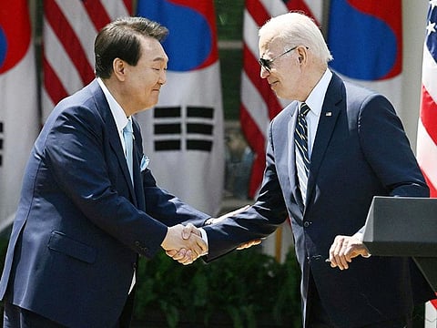US President Joe Biden and South Korean President Yoon Suk Yeol participate in a news conference in the Rose Garden of the White House in Washington, DC, on April 26, 2023.