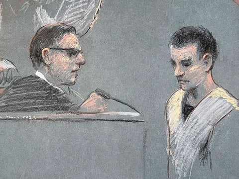 Massachusetts Air National Guardsman Jack Teixeira, right, appears in U.S. District Court in Boston, Friday, April 14, 2023.