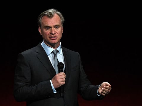 Director Christopher Nolan speaks on stage during Universal Pictures and Focus Features presentation at CinemaCon 2023.
