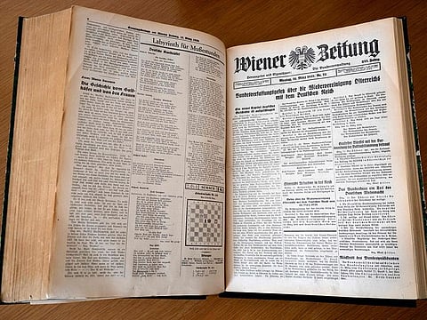 Picture taken on April 26, 2023 at the Oesterreichische Nationalbibliothek (Austrian national library) in Vienna, Austria, shows an issue from March 14, 1938 of the Wiener Zeitung newspaper, announcing the annexation of Austria to Germany.