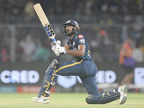 Gujarat Titans' Vijay Shankar plays a shot during the IPL match against Kolkata Knight Riders at the Eden Gardens Stadium in Kolkata on April 29, 2023.