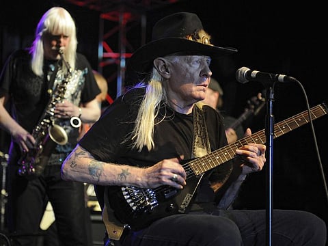 Johnny Winter, right, and Edgar Winter perform during Hippiefest at Seminole Coconut Creek Casino, in Coconut Creek, Fla., Aug. 26, 2012. Nearly nine years after Johnny Winter's death, a battle for control of the legendary blues guitarist's music is being fought in a Connecticut court with nasty allegations of theft and greed flying. (Photo by Jeff Daly/Invision/AP, File)