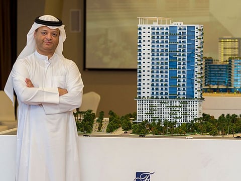 Dr. Faisal Ali Mousa, the Chairman of FAM Holding Group