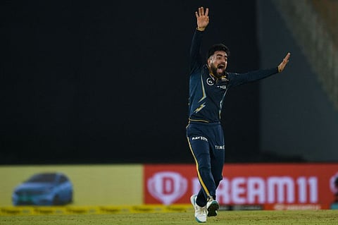 Gujarat Titans' Rashid Khan appeals successfully for a wicket. The Afghanistan leg-spinners' universal appeal has diminished and only growing with age.