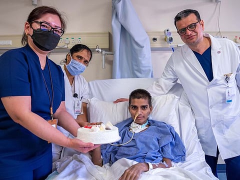 Sajjad Alam  with the medical team that saved his life in Abu Dhabi.