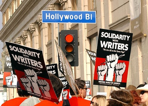 This November 20, 2007, photo shows demonstrators holding signs during the 20072008 Writers Guild of America strike in Hollywood.
