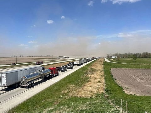 A crash involving at least 20 vehicles shut down a highway in Illinois, Monday, May 1, 2023.