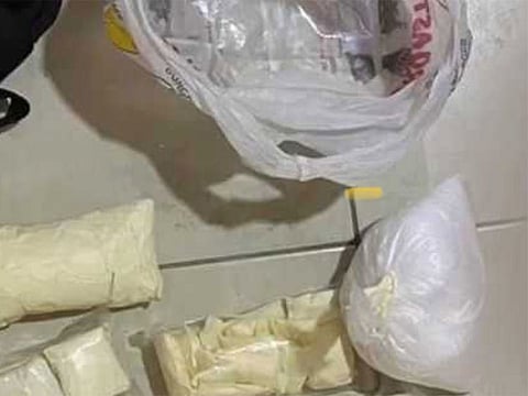 A part of the peddled drugs that was seized by Sharjah Police.