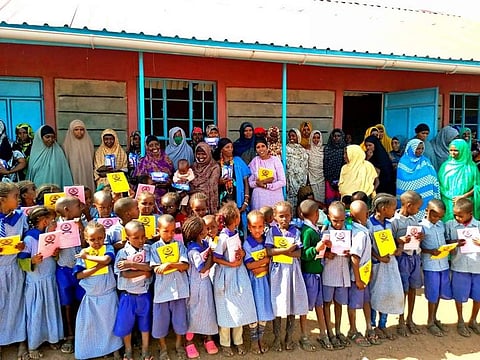 Students and adult learners at the school Anna built in her village in Kenya