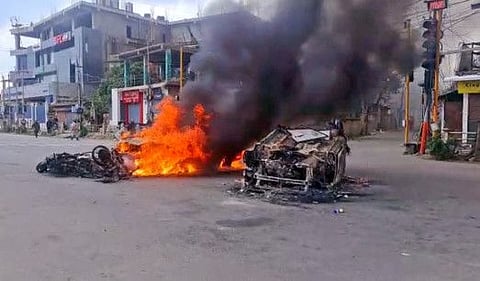 Vehicles set ablaze after violence broke out between tribals and non-tribals during 'Tribal Solidarity March' called by All Tribal Student Union Manipur (ATSUM), in Imphal on Thursday, May 4, 2023.