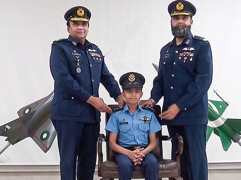 Pakistan Air Force’s Air Vice Marshal Khalid Mehmood and Air Commodore Asim Rana awarded ranks to young Abdullah Naveed.