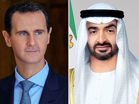 Sheikh Mohamed bin Zayed Al Nahyan (R) and Syrian President Bashar Al Assad.