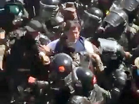 Imran Khan being taken into custody on Tuesday.