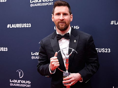 Footballer Lionel Messi poses after winning the 2023 Laureus World Sportsman of the Year Award.