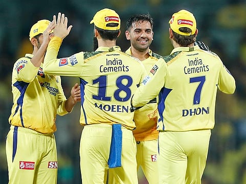 Chennai Super Kings' Deepak Chahar celebrates a wicket with teammates during the IPL match against Delhi Capitals at MA Chidambaram Stadium, in Chennai on Wednesday.