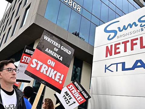 Writers picket outside Netflix offices in Hollywood, California.