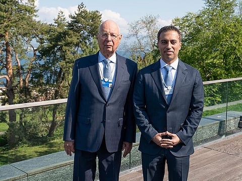Dr. Ahmed Belhoul Al Falasi, Minister of Education, right, with Professor Klaus Schwab, Founder and Executive Chairman of WEF.