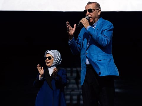 Erdogan speaks on stage with his wife Emine Erdogan during an election campaign rally in Istanbul, Turkey, on  May 7, 2023.