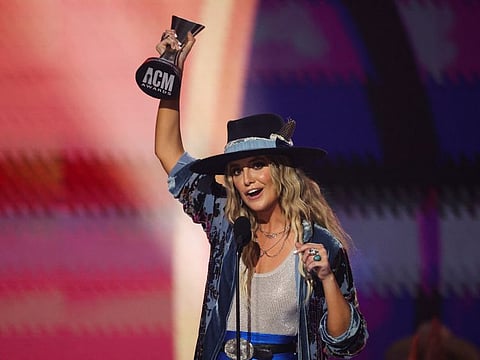 Lainey Wilson accepts the award for Female Album of the Year at the 58th Academy of Country Music Awards in Frisco, Texas.