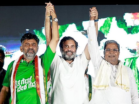 Congress leader Rahul Gandhi with Karnataka party president DK Shivakumar and party leader Siddaramaiah
