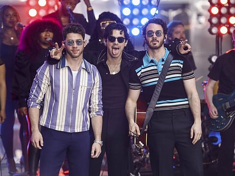 Nick Jonas, Joe Jonas and Kevin Jonas of the Jonas Brothers perform on NBC's Today show at Rockefeller Plaza on May 12, 2023, in New York.