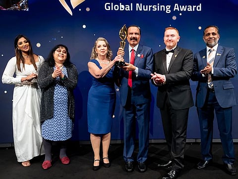 Award winner Margaret Helen Shepherd from the UK with Dr Azad Moopen and other representatives during the award ceremony in London on Friday