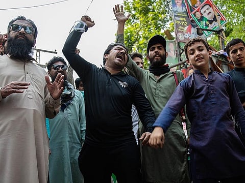 Supporters of Imran Khan, former Pakistan premier, celebrate his release outside his Zaman Park residence in Lahore, Pakistan, on Friday, May 12, 2023.