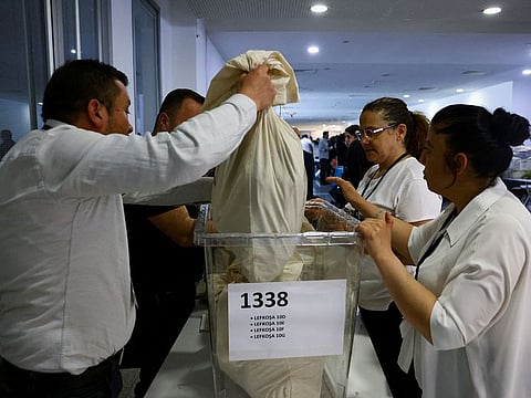 Staff work on the day of the presidential and parliamentary elections at a polling station in Ankara, Turkey.