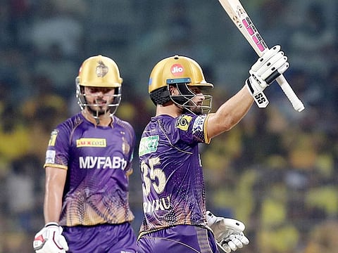 Kolkata Knight Riders' Rinku Singh celebrates after completing a fifty as skipper Nitish Rana looks on against Chennai Super Kings on Sunday.
