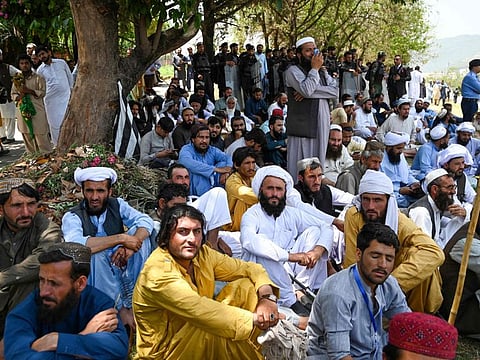 Supporters of parties from Pakistan's ruling alliance gather near the Supreme Court in Islamabad on May 15, 2023, to protest against the judiciarys alleged undue facilitation to former Pakistans Prime Minister Imran Khan.
