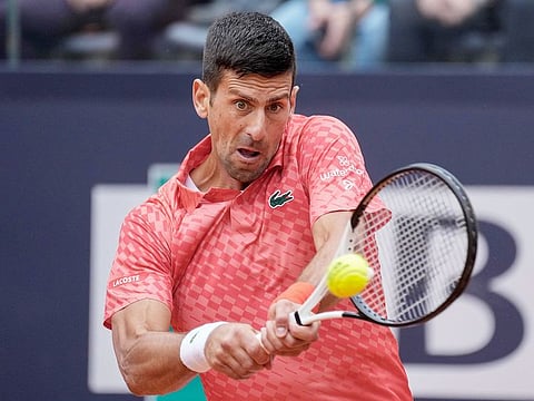 Novak Djokovic of Serbia returns the ball to Cameron Norrie of Britain at the Italian Open tennis tournament, in Rome, on May 16, 2023.