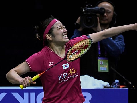 An Se-young of South Korea celebrates after her win against Akane Yamaguchi of Japan during their women's singles match at Sudirman Cup.