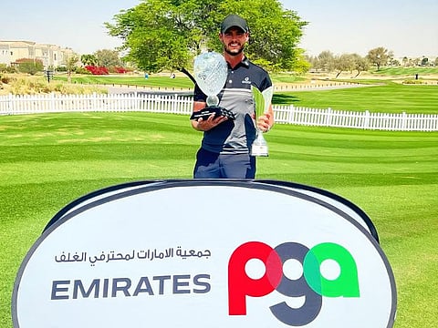 Jackson Bell (TFA, JGE) with the 2022 - 2023 UAE PGA Matchplay and Order of Merit Trophies