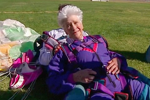 In this image made from video, Clare Nowland reacts following her skydive in Canberra, Australia April 6, 2008. Nowland, now 95, was in critical condition Friday, May 19, 2023, two days after police shocked her with a stun gun as she approached them with a walking frame and a steak knife in an Australian nursing home.