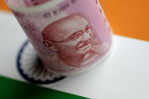 FILE PHOTO: An India Rupee note is seen in this illustration photo June 1, 2017. REUTERS/Thomas White/Illustration/File Photo