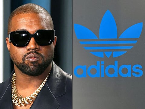 This combination of pictures created on October 25, 2022 shows Kanye West attending the 2020 Vanity Fair Oscar Party in Beverly Hills on February 10, 2020.