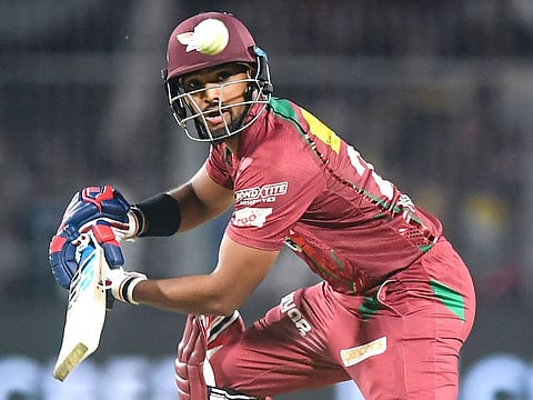 Lucknow Super Giants' Nicholas Pooran plays a shot during the IPL match against Kolkata Knight Riders at the Eden Gardens Stadium in Kolkata on May 20, 2023.
