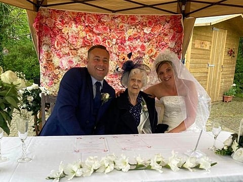 Mark Rodgers and Bianca Suarez with 99-year-old Margaret Ripley