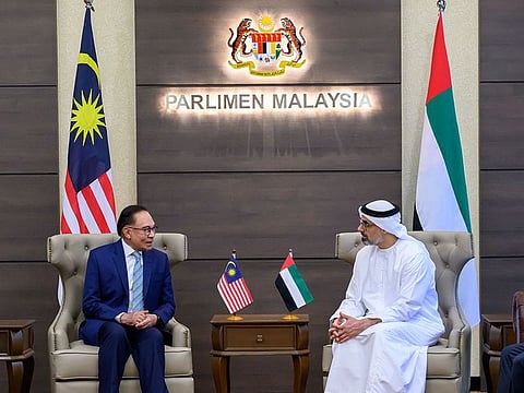 Sheikh Khaled bin Mohamed bin Zayed Al Nahyan (right), Crown Prince of Abu Dhabi, with Anwar Ibrahim, Prime Minister of Malaysia, in Kuala Lumpur on Monday
