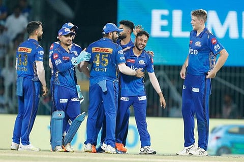 Mumbai Indians' players celebrate the team's win in the Indian Premier League (IPL) 2023 Eliminator match against Lucknow Super Giants, at MA Chidambaram Stadium, in Chennai.
